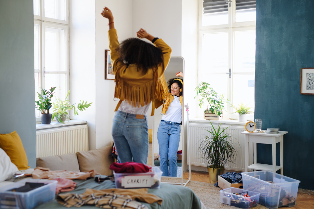 woman dancing happy to music