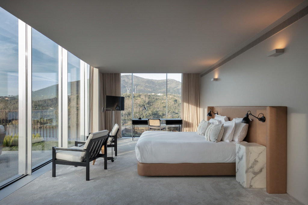 Bedroom with floor to ceiling windows