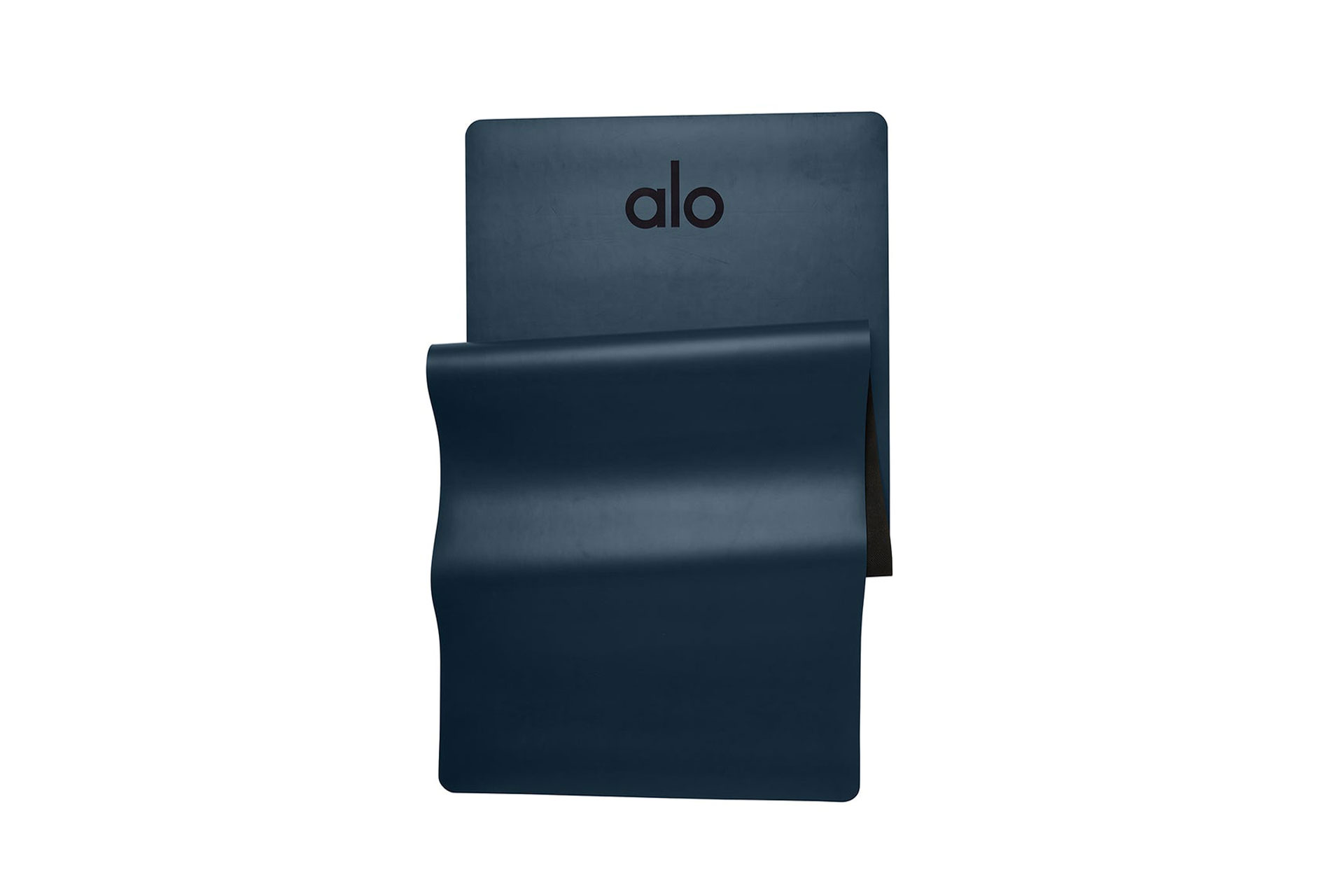 a luxury Alo yoga mat dark blue facing upwards