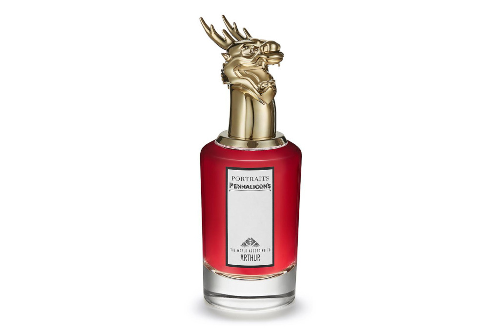 Red perfume bottle with gold dragon head on top