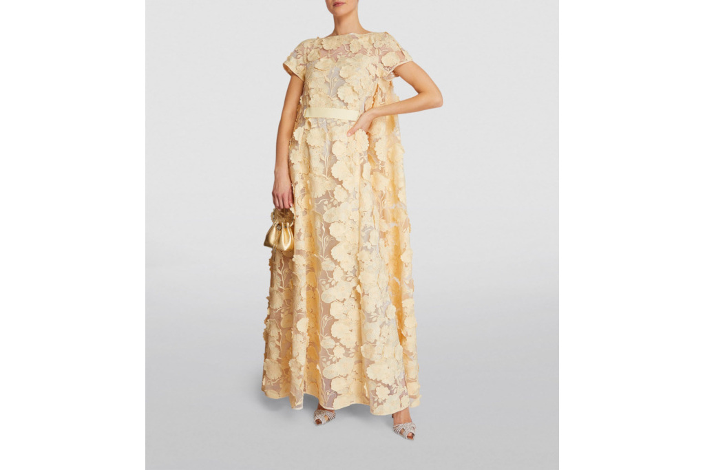Woman in yellow floral dress