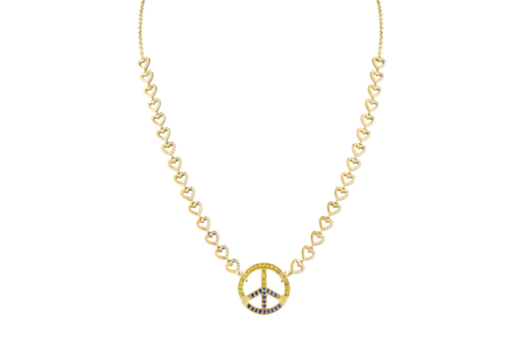 Peace sign necklace with blue and yellow sapphires