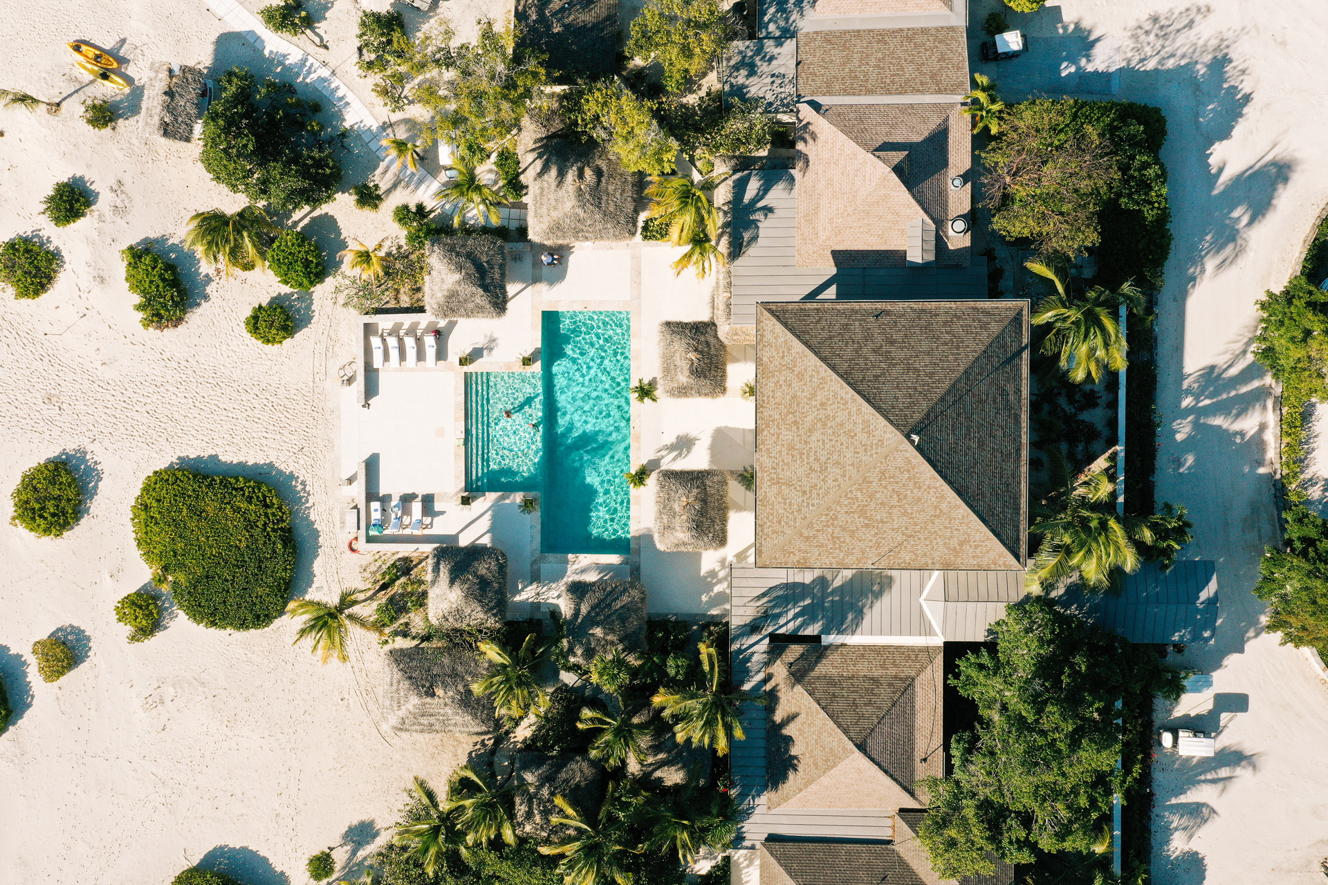 aerial shot of pine cay, a beach hotel in the caribbean