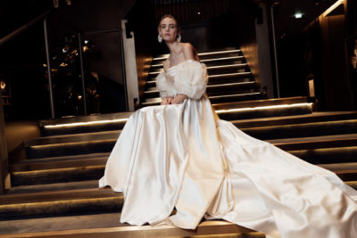 Model in Riri Sleeves and Dove Skirt