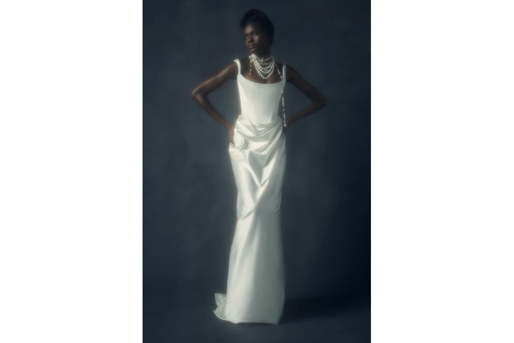 Model in figure-hugging wedding dress