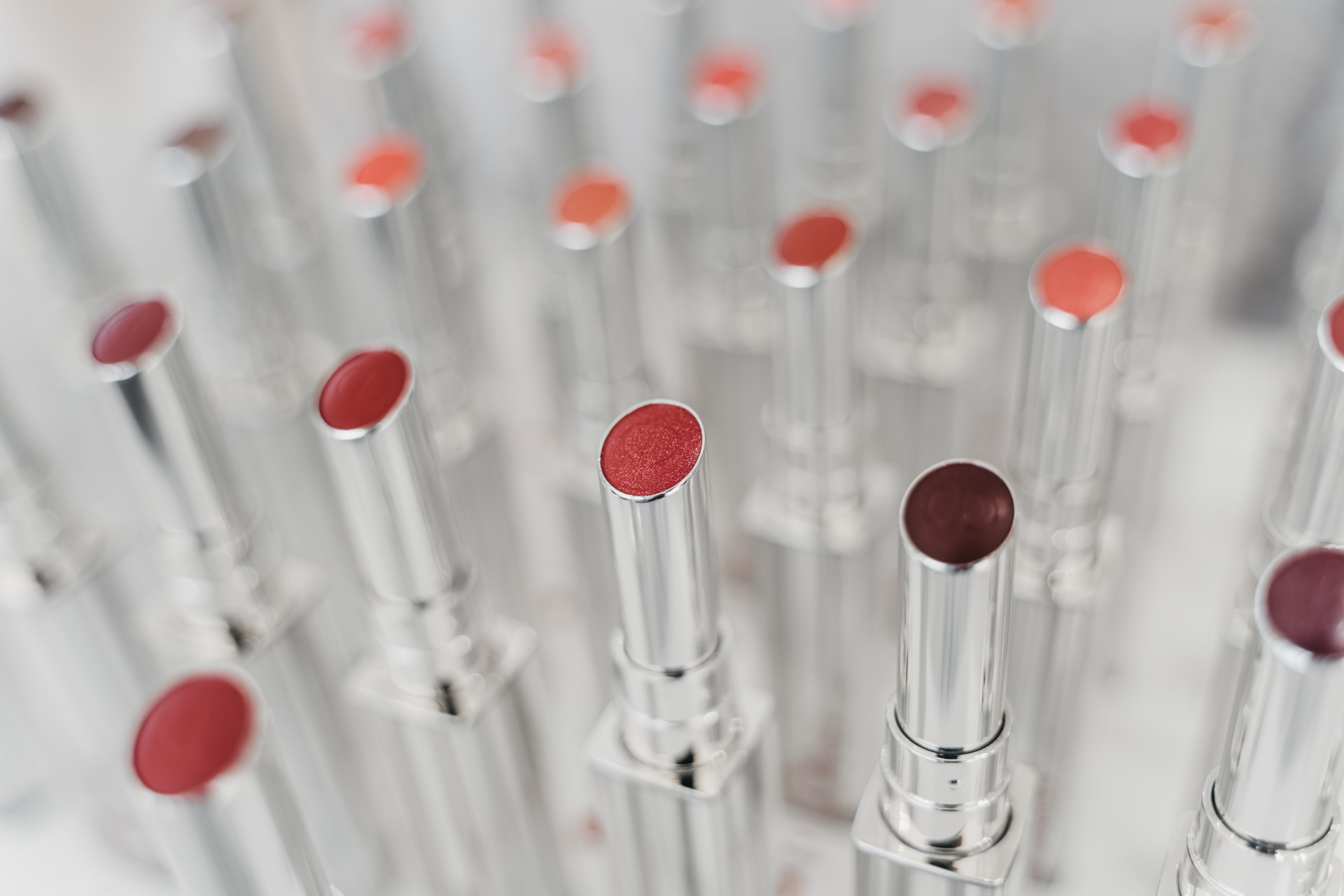 Line of open lipsticks