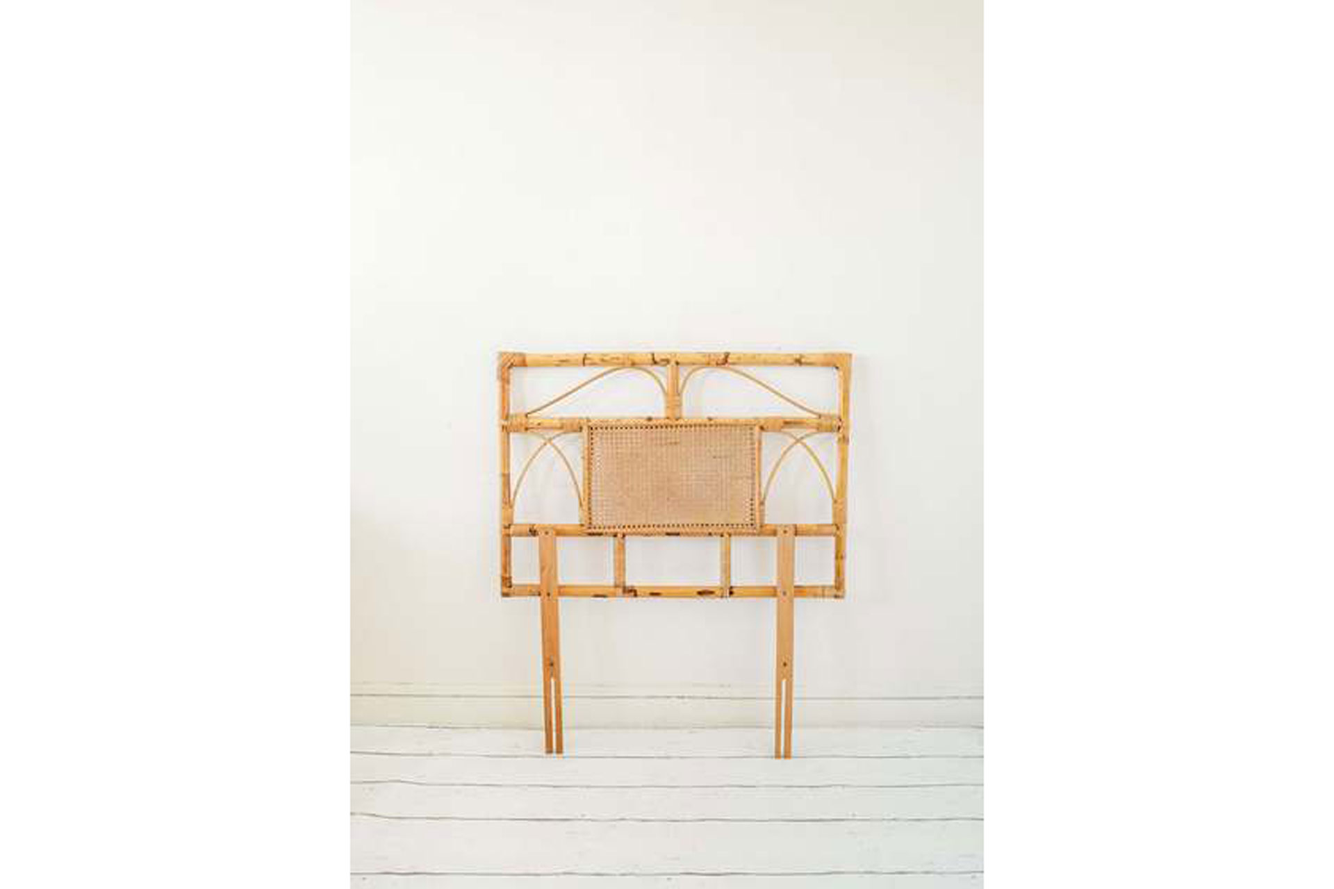 A single bed rattan Vinterior headboard