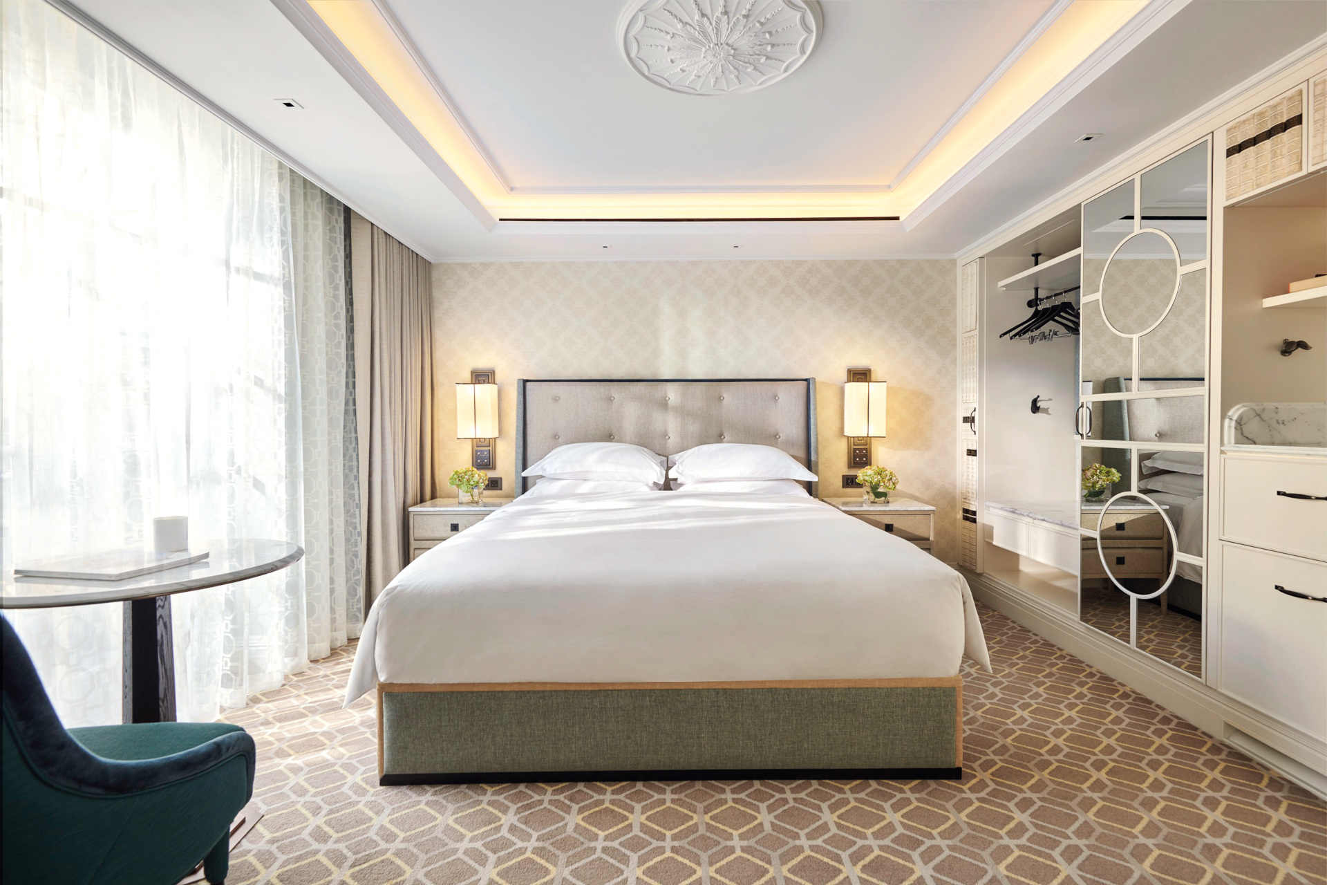 Hotel room with white sheets