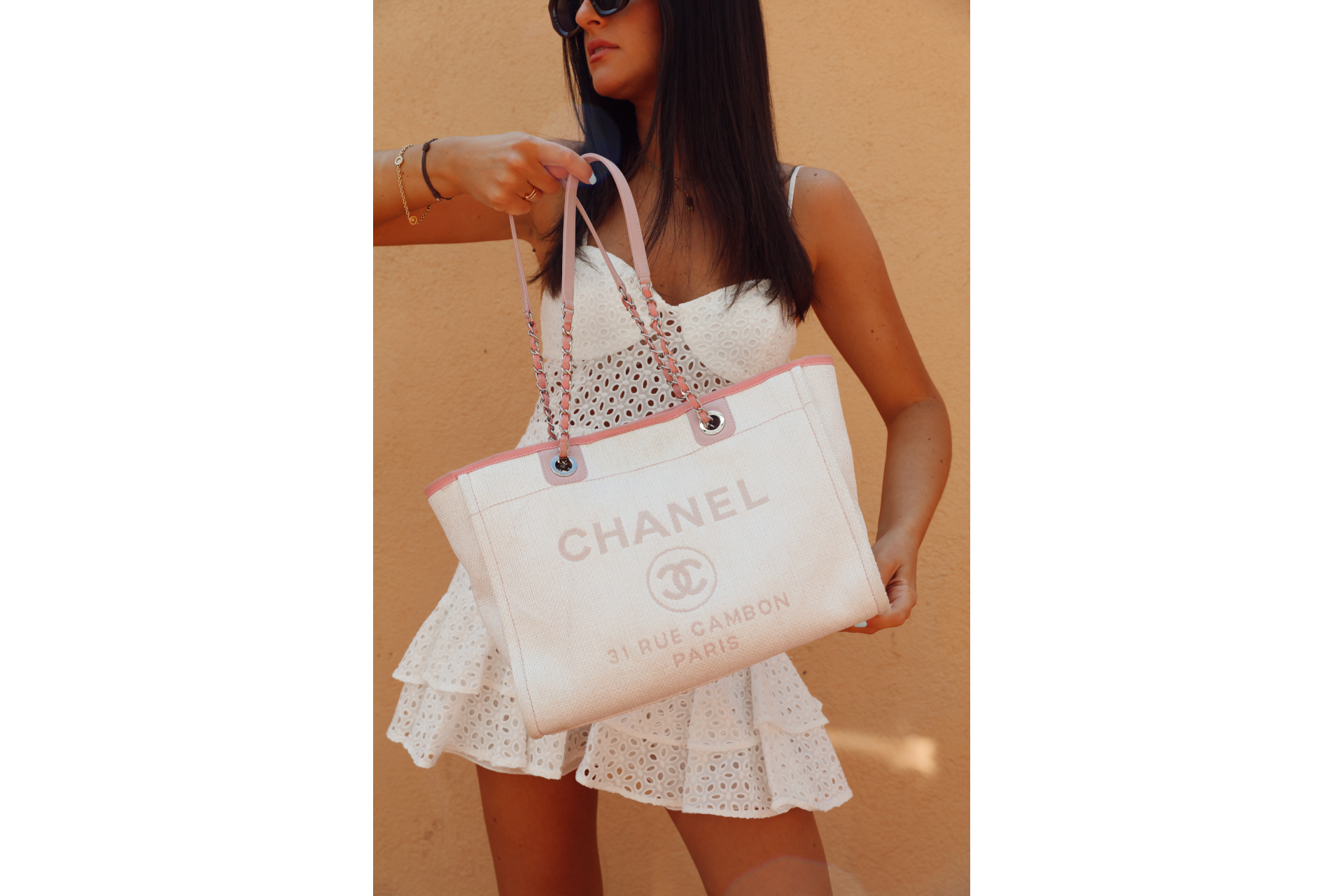 Woman carrying Chanel handbag