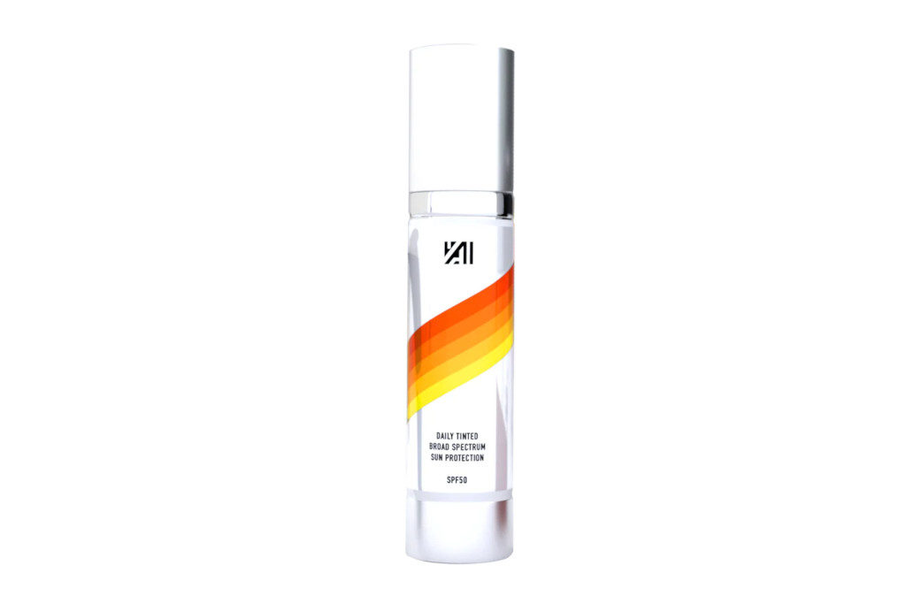 White bottle with red, orange and yellow stripe
