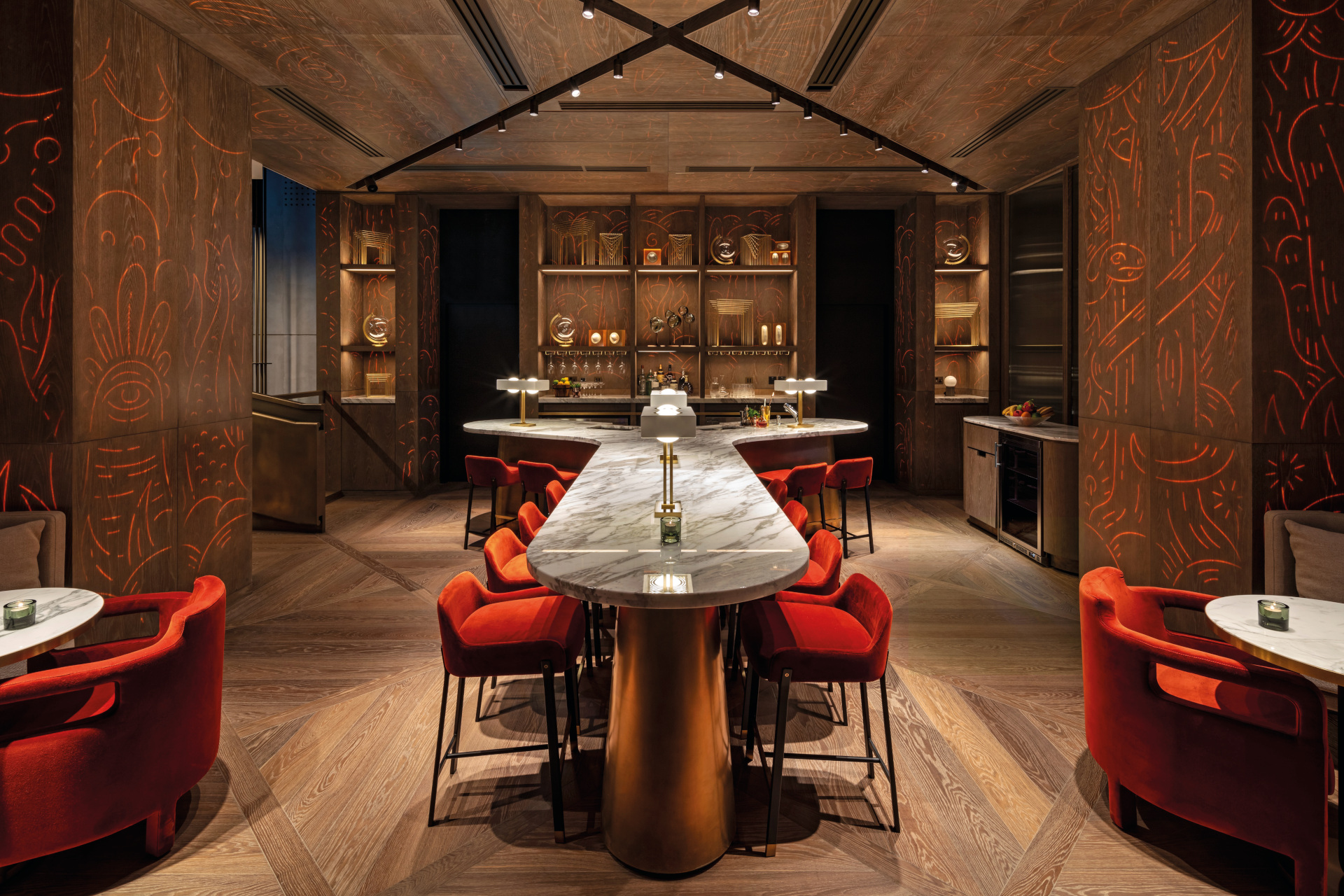 Long table with red stools