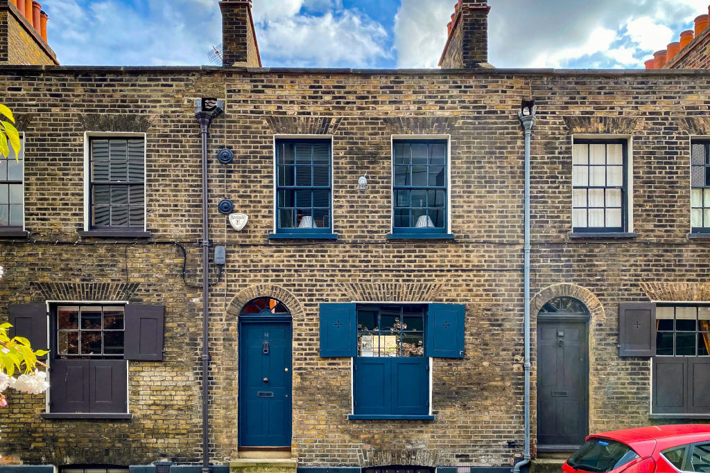 East End London Georgian terraced house with blue doors and windows