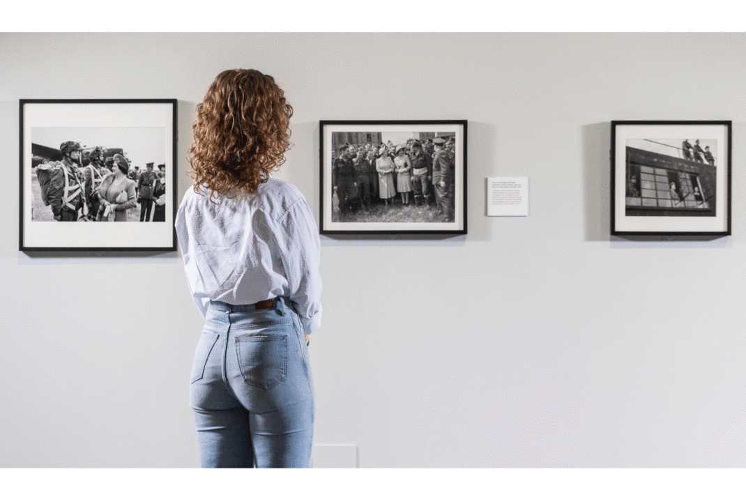 © IWM Installation shot of Crown & Conflict: Portraits of a Queen in Wartime at IWM London (27 May 2022 – 8 January 2023).