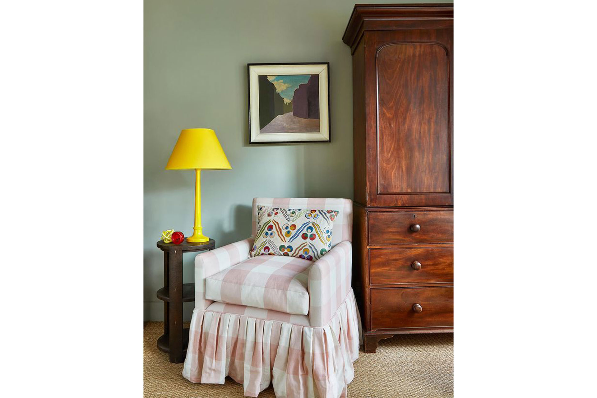 a sofa in a green room by Salvesengraham