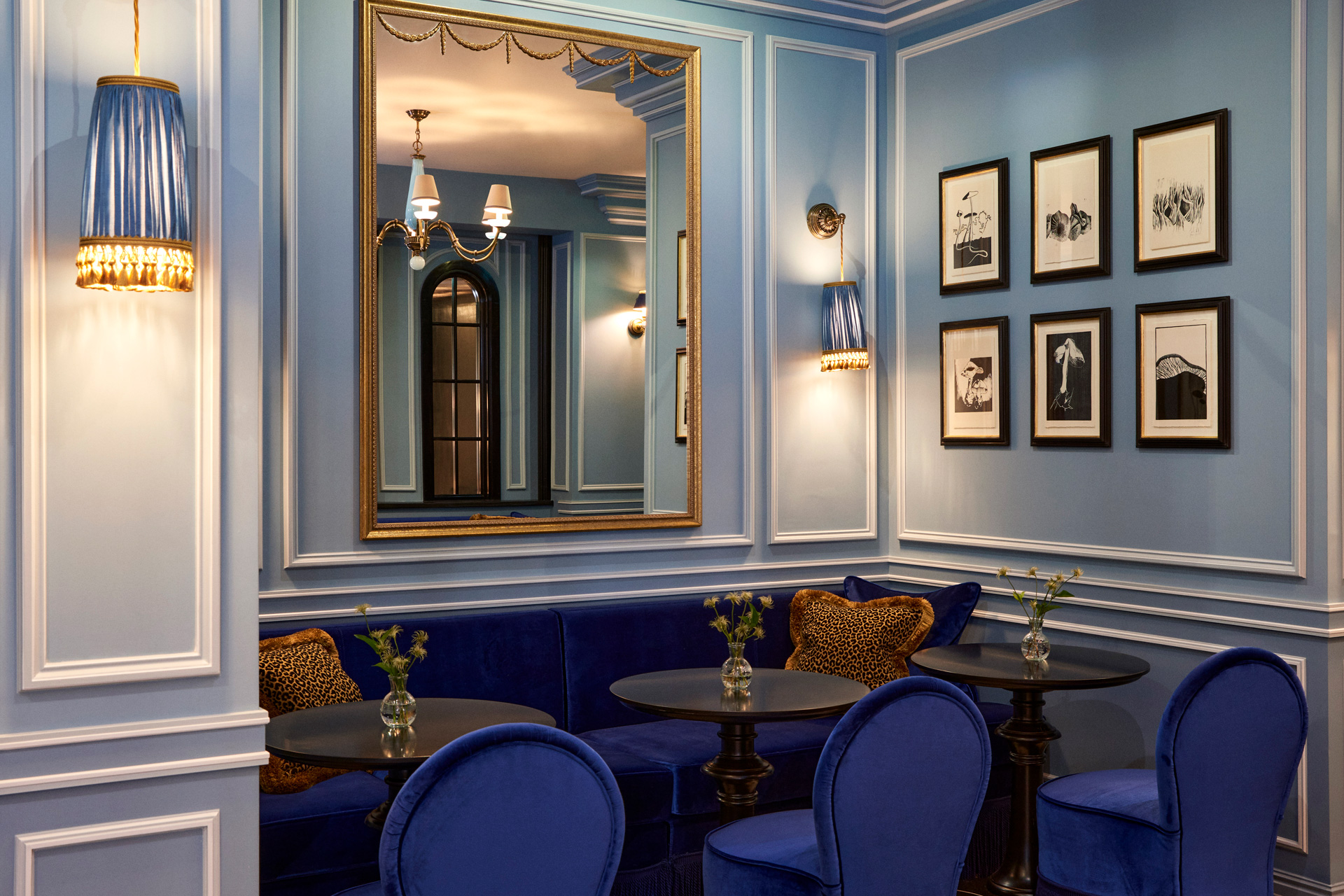 a blue restaurant dining at The Twenty Two members club in London