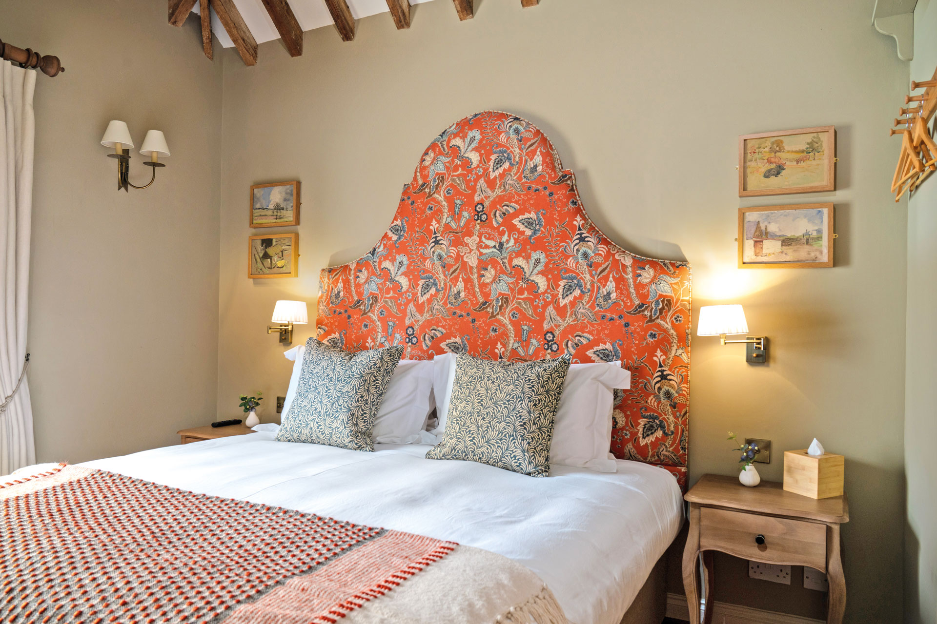 Bed with colourful headboard