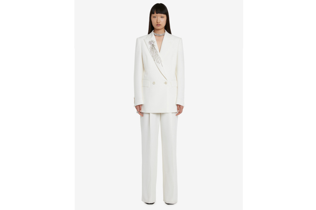 Woman in white suit