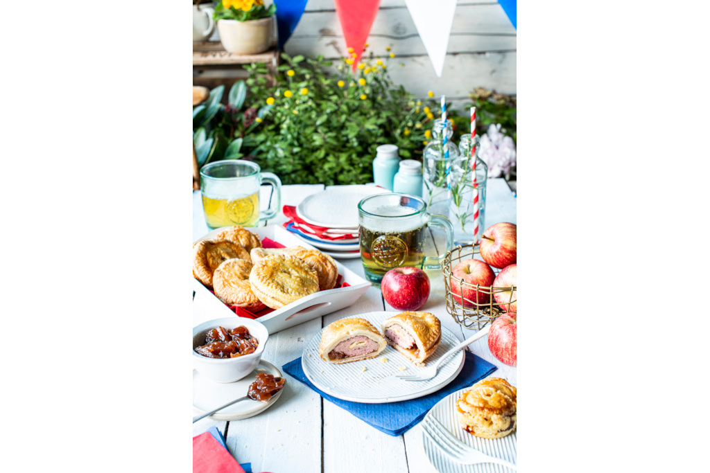 Table spread with miniature pies
