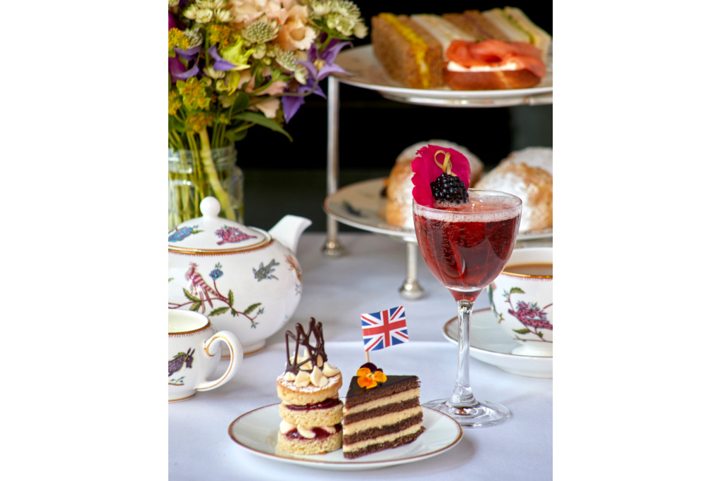 Plate of cakes and glass of fizz