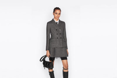 Woman in tweed suit
