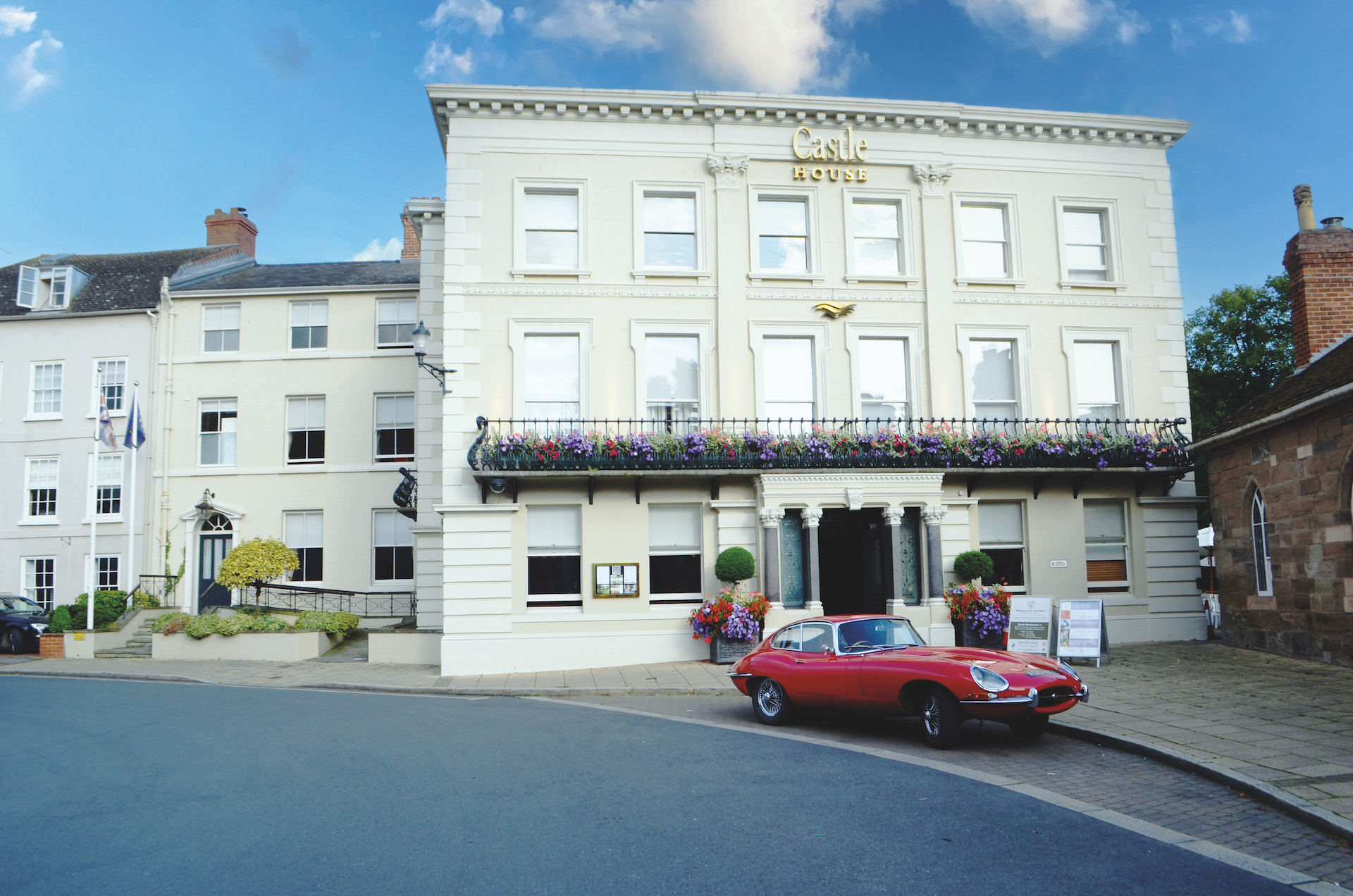 Castle House exterior with Jaguar car