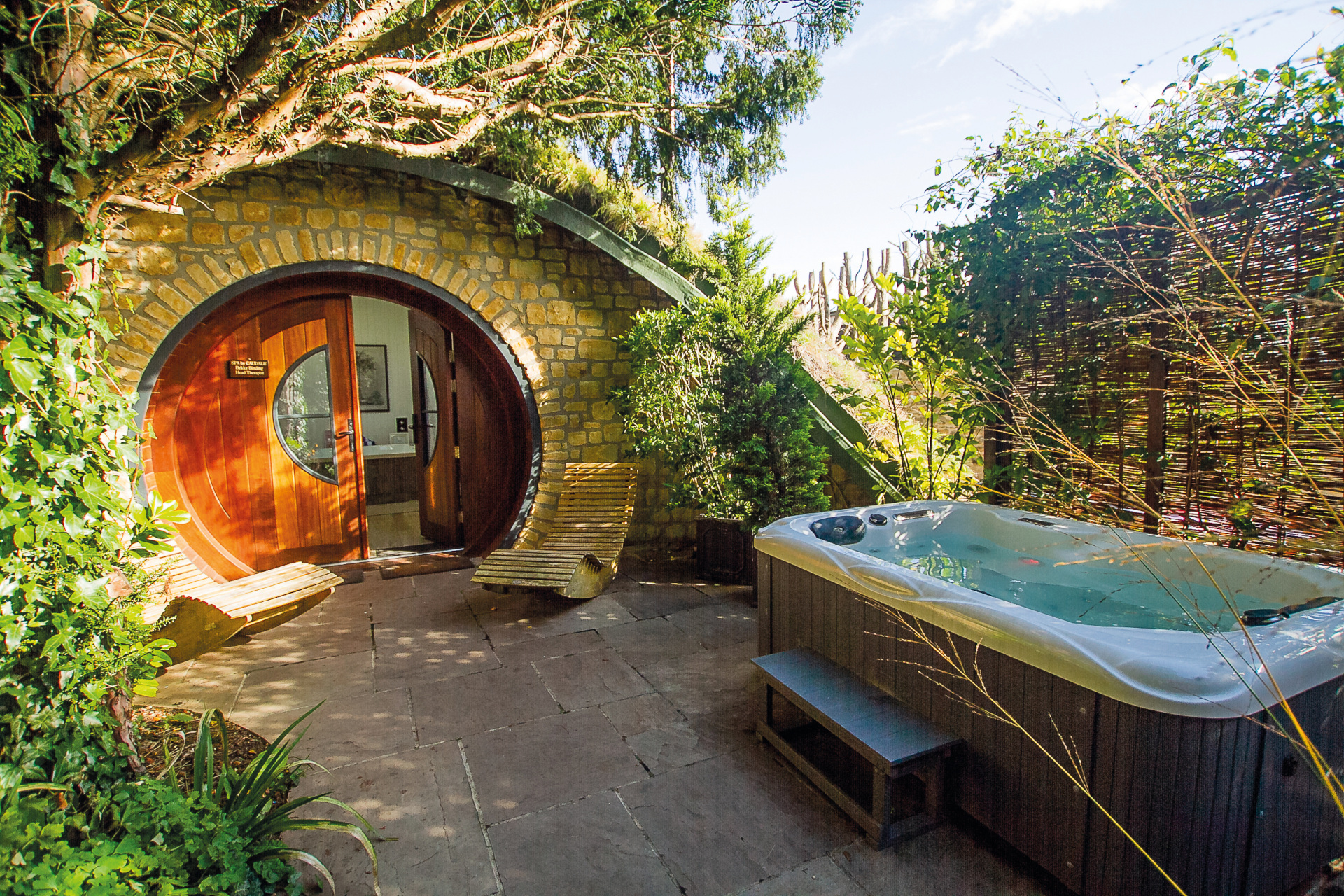 Cottage back door with hot tub