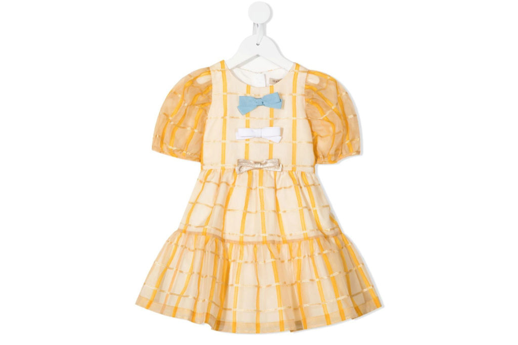 Yellow dress with blue, white and gold bows