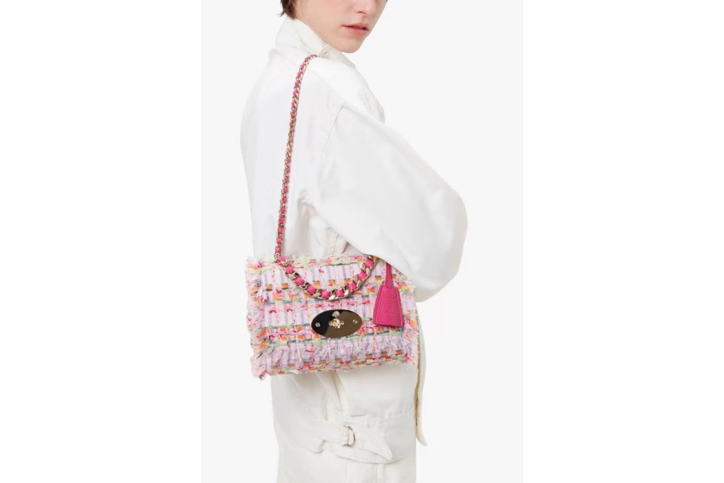 Model with pink handbag