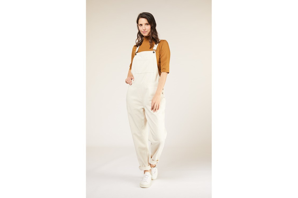 Model in cream dungarees