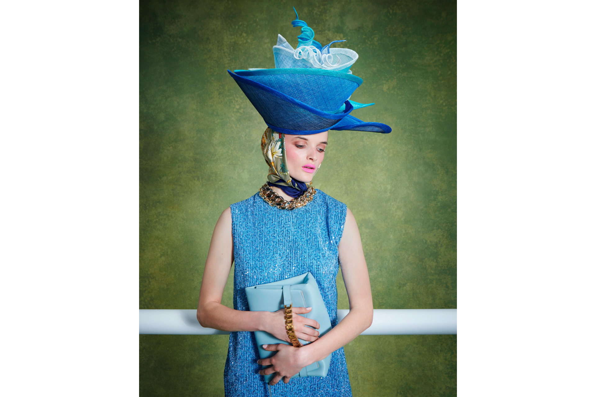 Woman in blue dress and hat