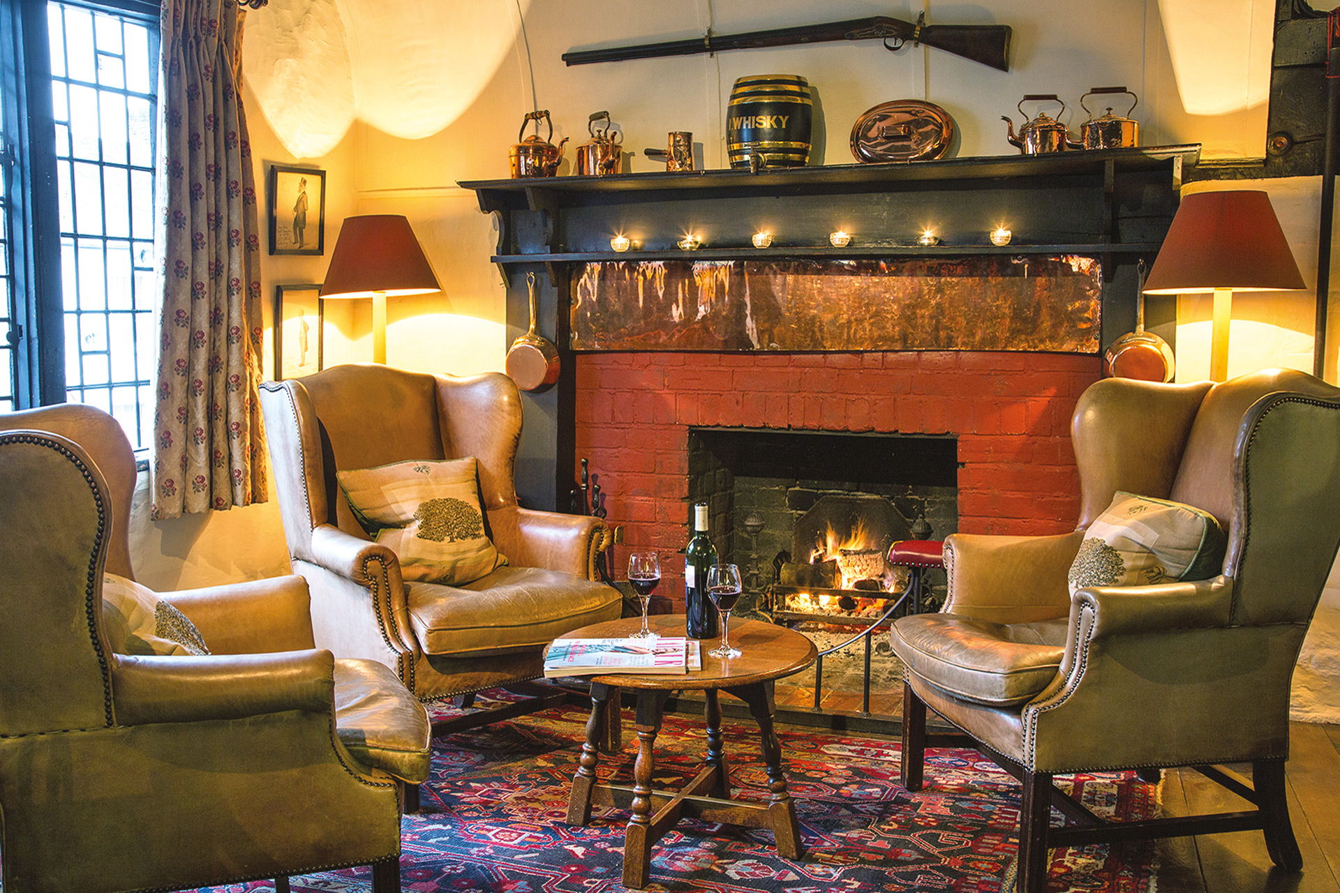 Living room with fireplace at the Spread Eagle.