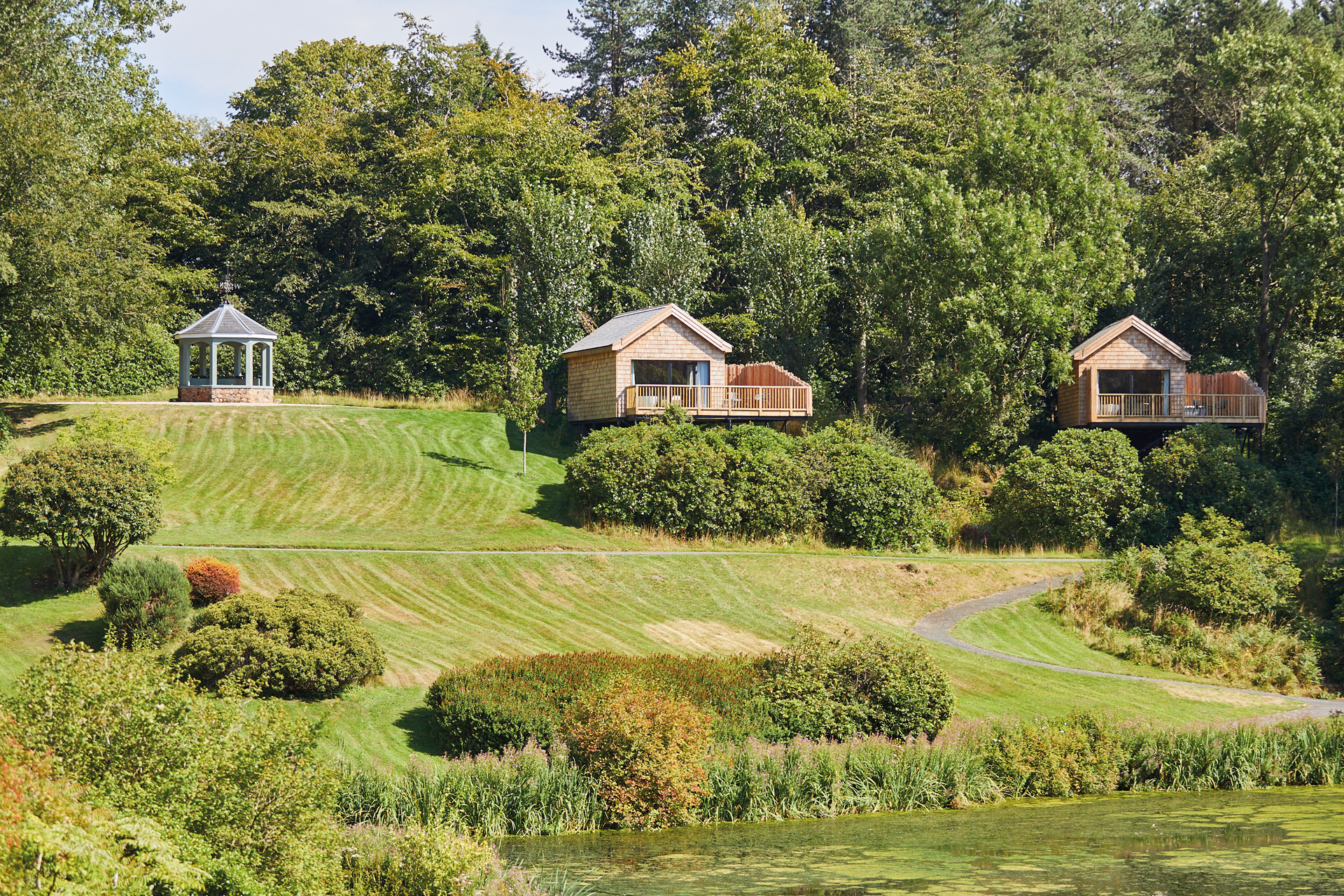 Timber huts within fields