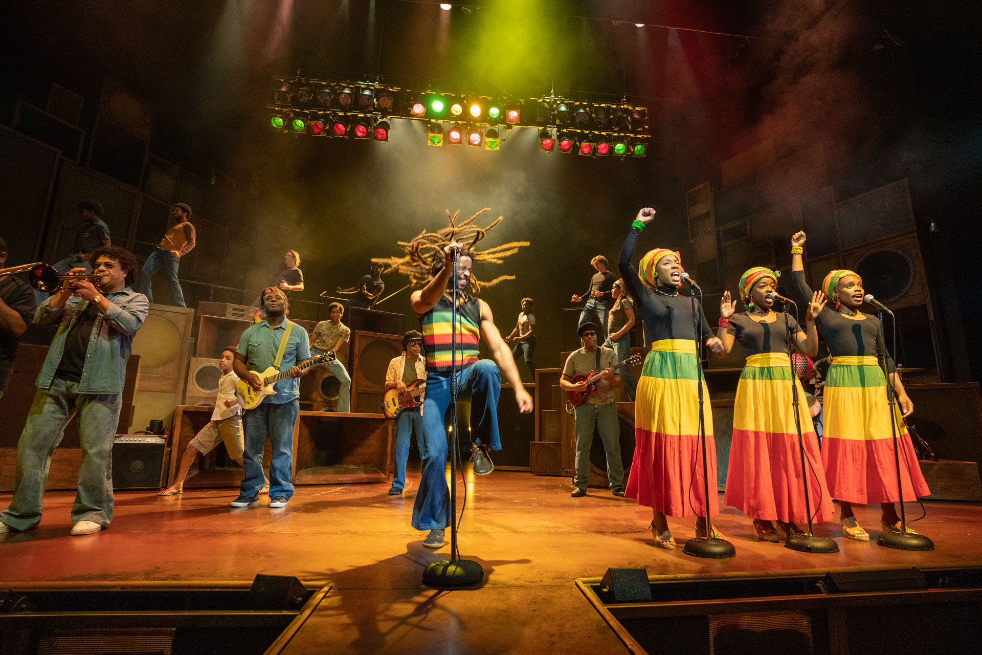 Cast dancing in Get Up, Stand Up! The Bob Marley Musical