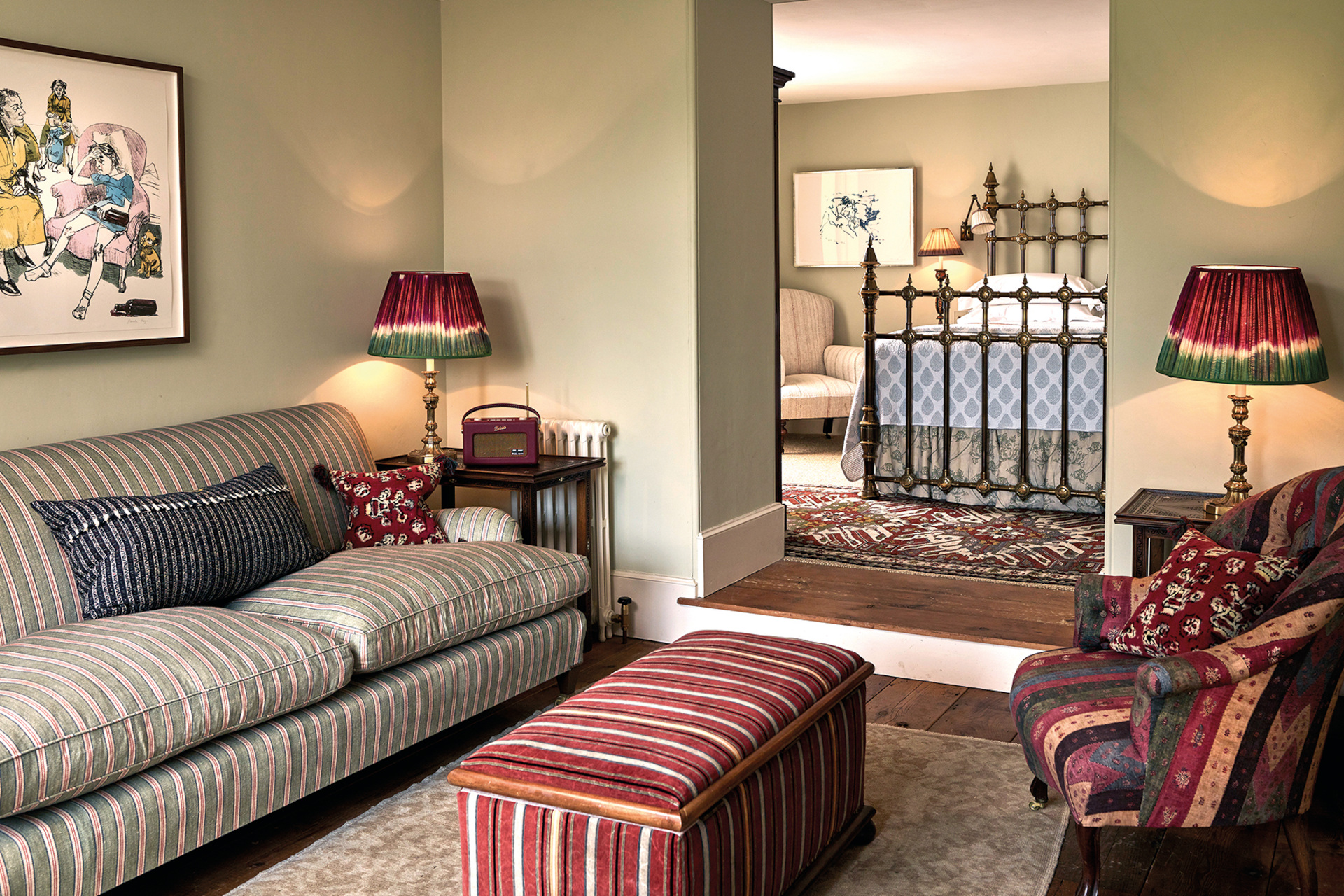 Cosy living room with doorway into bedroom