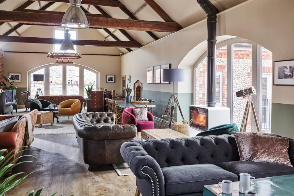 Open plan seating area with exposed beam ceilings