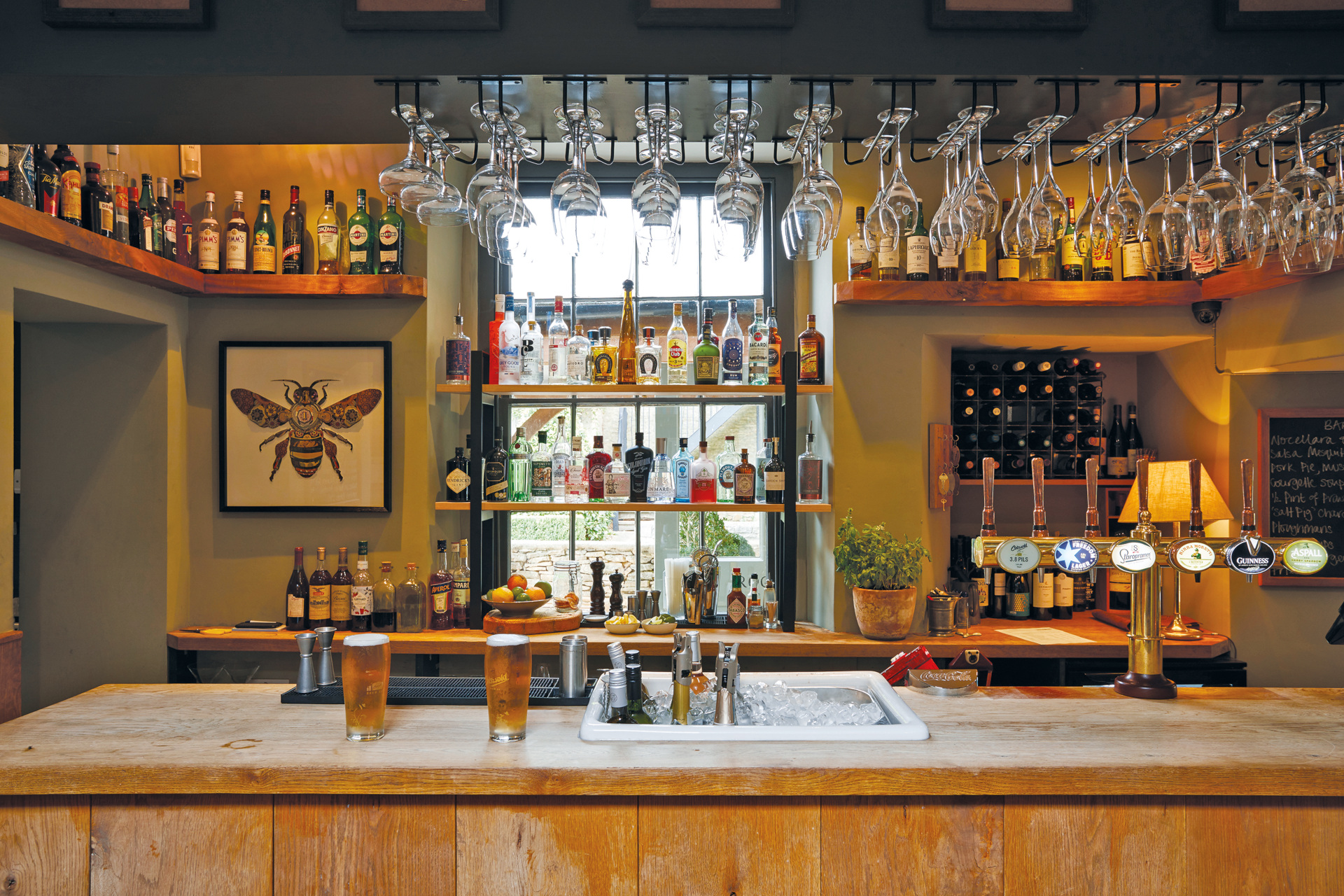 Bar with glasses hanging overhead