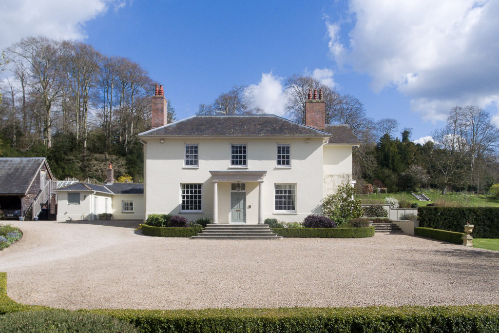 regency rectory wiltshire white double fronted country home exterior shot