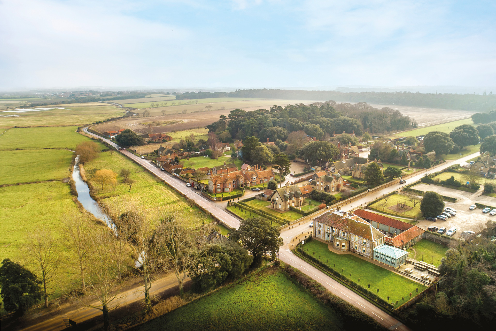 Aerial view of the Victoria hotel, with fields surrounding.