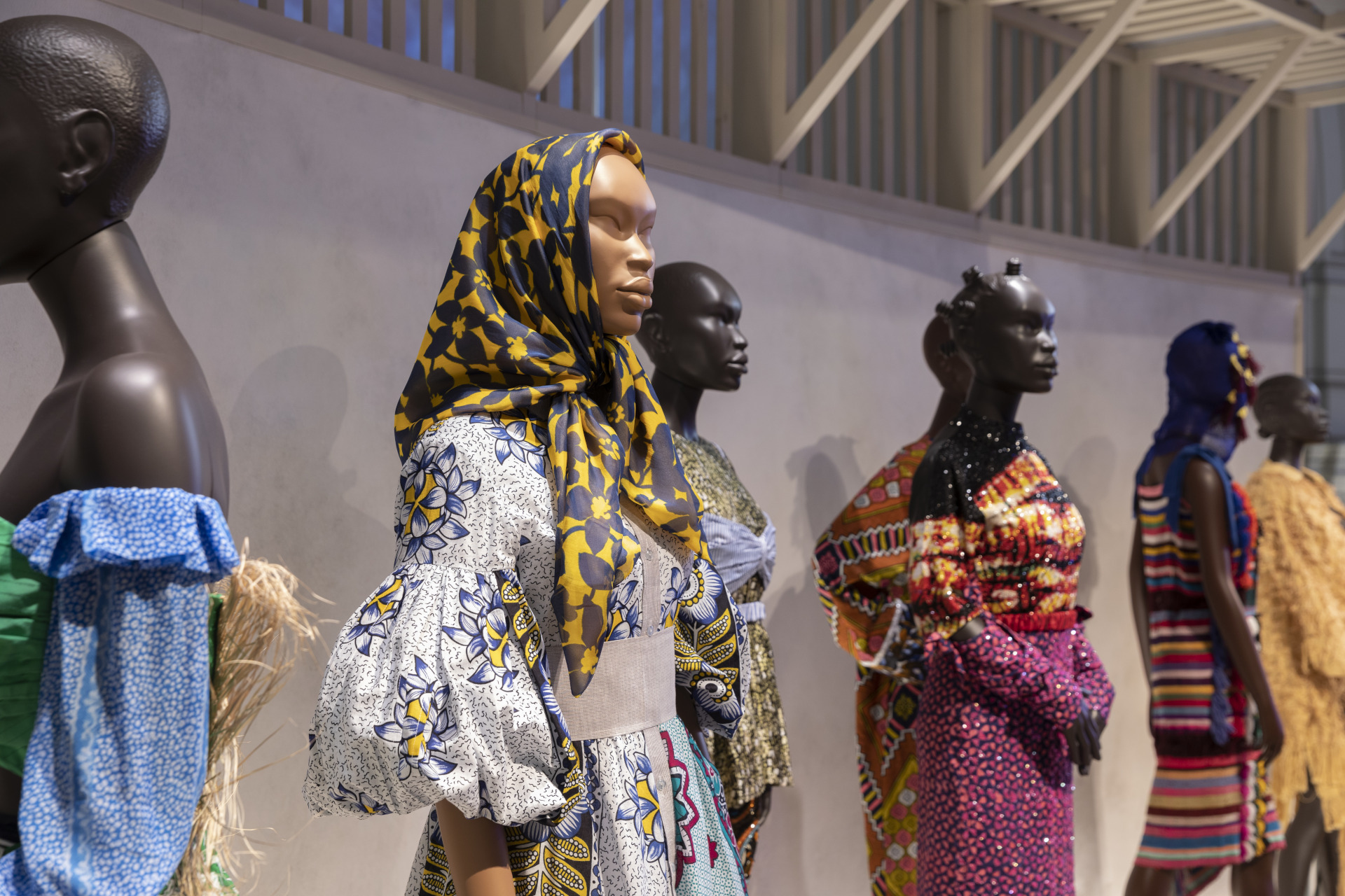Mannequins lined up in display of contemporary African runway fashion