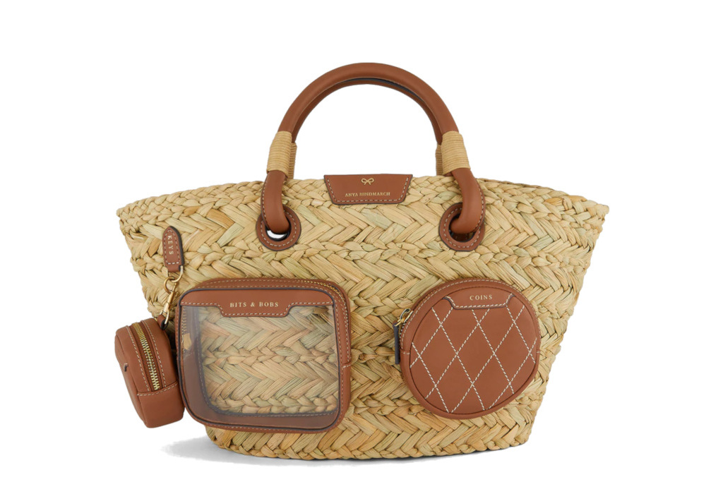 Woven bag with extra compartments on the outside