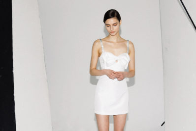 Model in short wedding dress