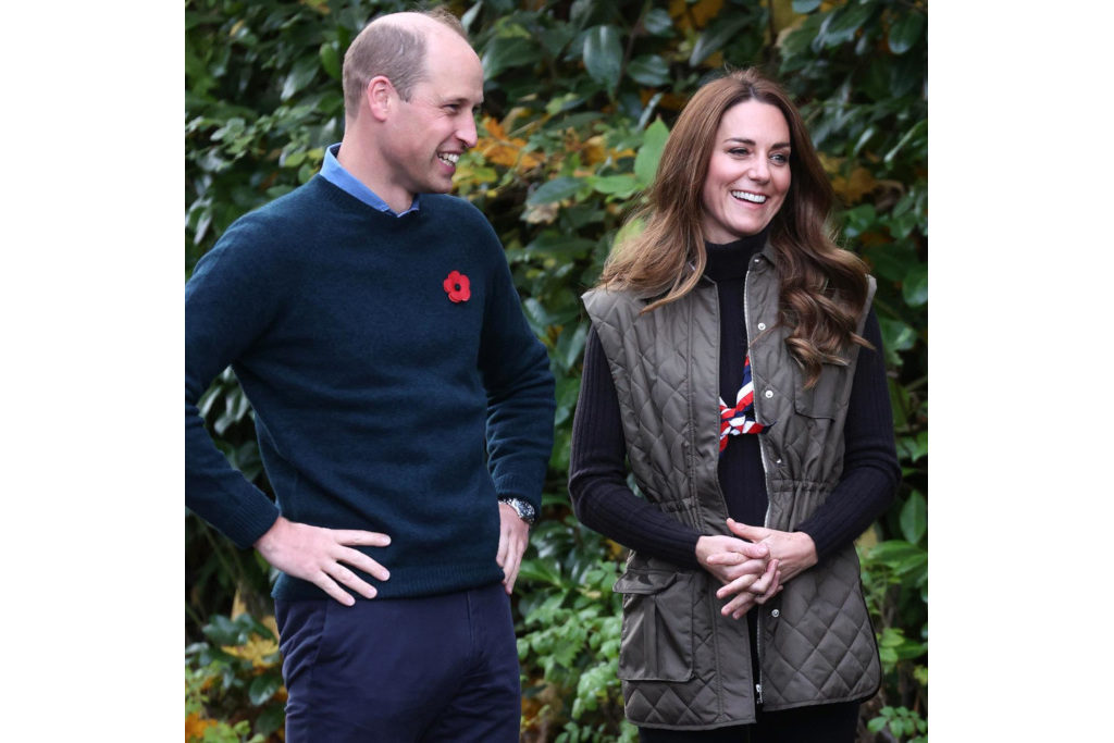 The Duke and Duchess of Cambridge stood outdoors in country clothes