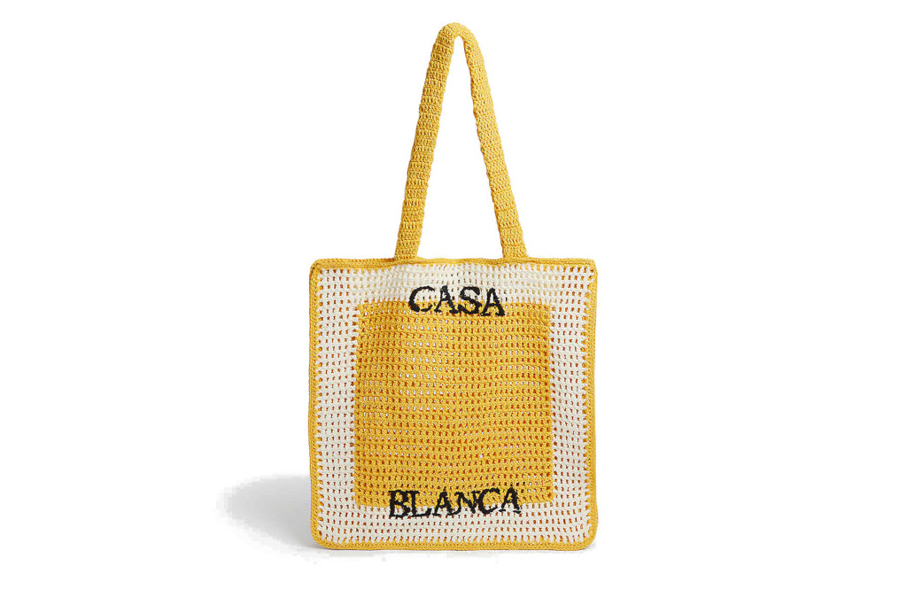 Yellow woven tote bag with 'Casablanca' spelt on the front