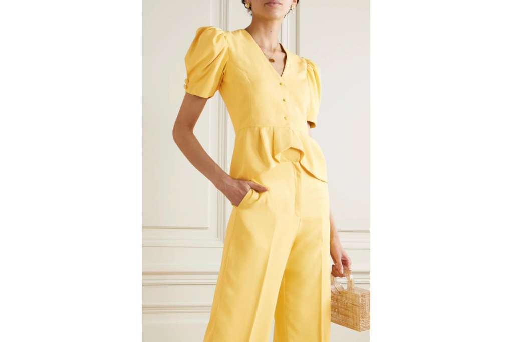 Woman in yellow top and trousers