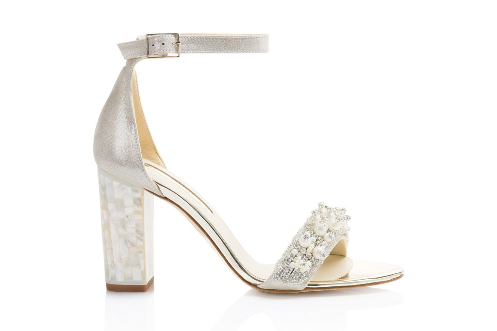 Pearlescent heels with silver embellishments and gems on the lower strap