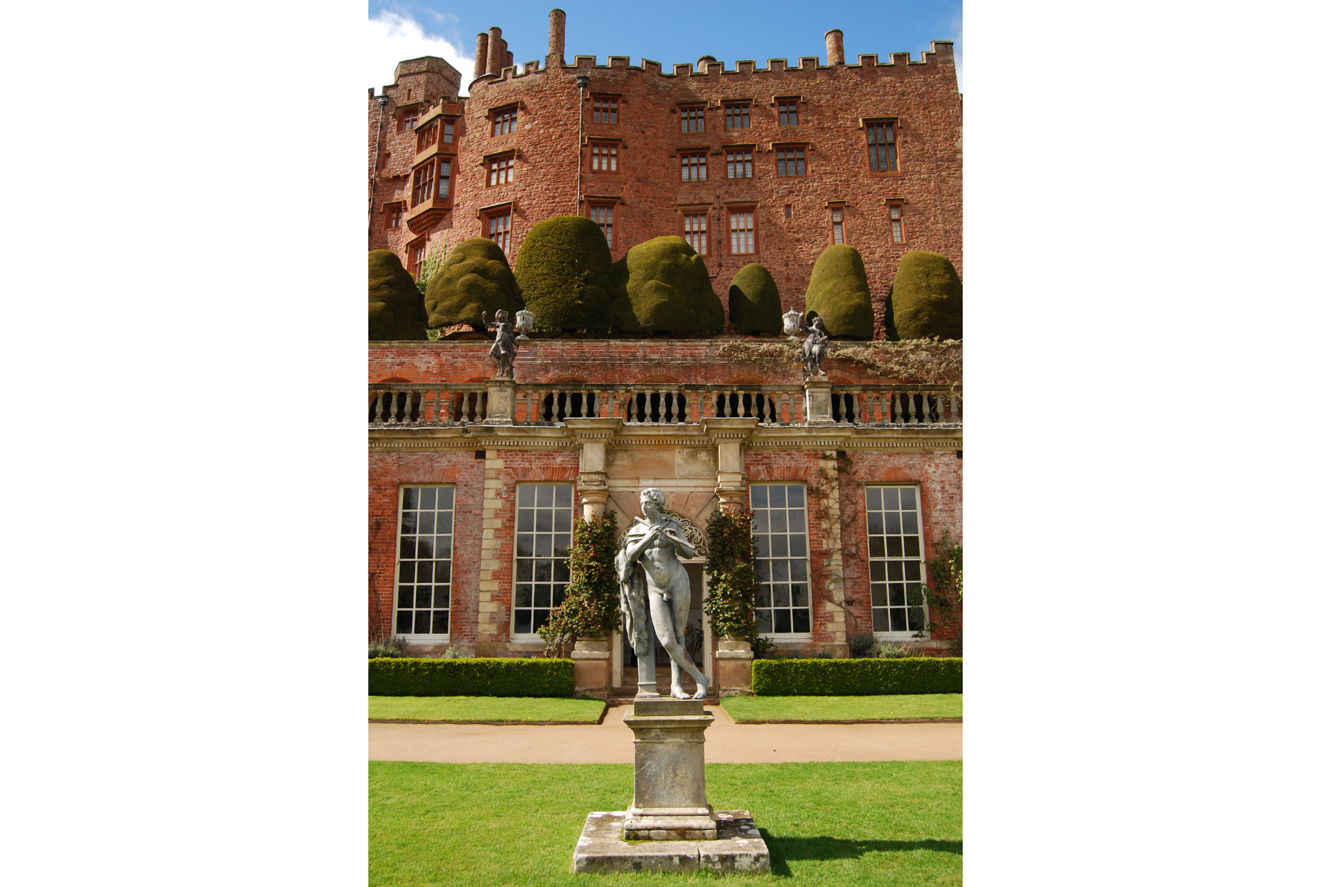 Powis Castle (Welsh: Castell Powis or Castell Coch) is a medieval castle, fortress and grand country mansion located near the town of Welshpool, in Powys, Mid Wales.