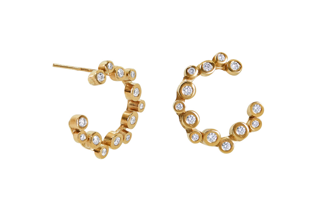 Half circle gold earrings with small gems