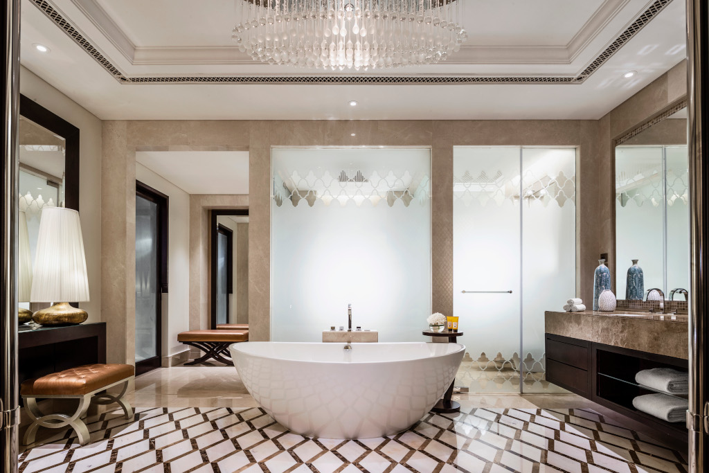 marble bathroom with freestanding bath at The Palm