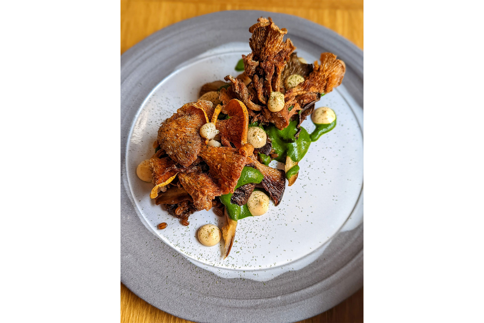 Summer oyster & black pearl mushrooms, ‘XO’ sauce, Flanders wheat, with wild garlic. 