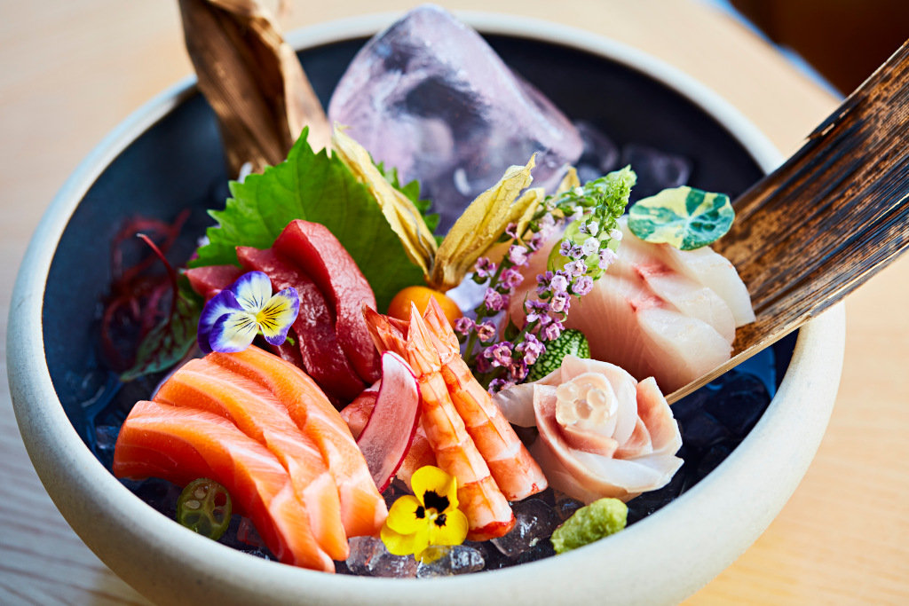 sushi sashimi bowl with pretty flowers at sushisamba 